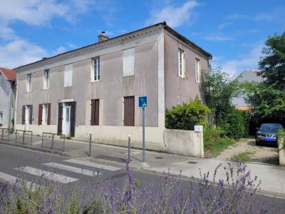 View of the house and the courtyard/carpark from the main street